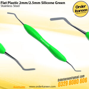 Double-ended 2mm flat plastic composite instrument with green ergonomic silicone handle for non-stick dental restorations.