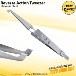 Stainless steel reverse-action tweezers with fiber grips holding a small component for soldering.